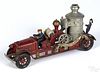 Kenton cast iron fire pumper with a painted driver, passenger, and a nickel-plated boiler