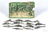 Arcade Toy Army Set miniature nickel-plated guns, airplane, and sword, on the original card