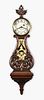 Elmer O. Stennes carved hanging lyre clock