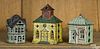 Three cast iron building still banks, to include a Kyser & Rex with a clock tower, 4 3/4'' h.