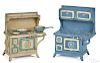 Two Grey Iron Blue Bird cast iron stoves, one with three miniature pots and pans, 10 1/4'' h.
