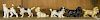 Six Hubley cast iron dog paperweights, tallest - 3''.