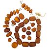 GROUP OF LARGE ANTIQUE BUTTERSCOTCH AMBER BEADS