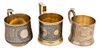 A GROUP OF THREE RUSSIAN SILVER TEA HOLDERS, VARIOUS MAKERS INCLUDING GRACHEV, ST. PETERSBURG AND MOSCOW, LAST QUARTER OF THE