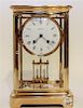 * A French Brass Regulator Clock Height 10 3/4 inches.