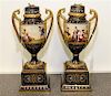 * A Pair of Vienna Porcelain Urns Height 10 3/4 inches.