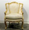 * A Louis XV Style Giltwood Canape a Oreilles. Height 38 1/2 inches.