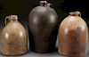 A GROUP OF THREE AMERICAN STONEWARE JUGS, 19TH C