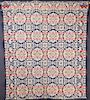 A BLUE, RED, GREEN AND IVORY COVERLET, MID 19TH C