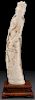 A LARGE CHINESE CARVED IVORY “KWAN-YIN” TUSK, EAR