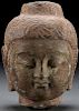 A CARVED STONE BUST OF A BUDDHA, PROBABLY 19TH C