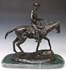 AFTER C.M. RUSSELL (D.1926) 'WILL ROGERS' BRONZE