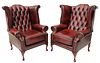 (2) ENGLISH TUFTED OXBLOOD LEATHER WING ARMCHAIRS