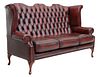 ENGLISH TUFTED OXBLOOD LEATHER WING SOFA