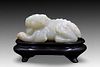 A Chinese Rare Jade Carving of a Mythical Lion from the Ming Dynasty (13th-16th Century). Stand is included

Width: Approximately 9.5cm

Private Colle