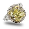 GIA Certified 4.01 Carat Cushion Cut Fancy Light Yellow Diamond and 18 Karat White Gold Engagement Ring