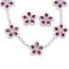 27.80 Carat Oval Cut Ruby, 12.18 Carat Round Brilliant Cut Diamond and 18 Karat White Gold Necklace and earring Suite.