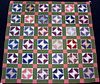 Pieced quilt, early 20th c., in a block pattern wi