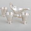 American Silver Gravy Boat and a Set of Three Tiffany & Co. Silver Cups