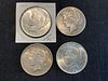Group of 4 Peace Silver Dollars