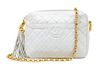 A Chanel White Quilted Handbag, 9" x 6.5" x 2.5".