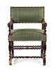 * An English Baroque Style Walnut Armchair Height 34 1/2 inches.