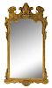 A George II Style Giltwood Mirror Height 44 1/4 x width 24 1/4 inches.