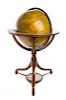 A Regency Mahogany Eighteen-Inch Terrestrial Floor Globe Height 39 x diameter 24 inches.
