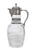 * A Victorian Silver Mounted Wheel Cut Claret Jug, Charles Edwards, London, 1884, the cover with engraved foliate and volute 