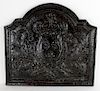 Antique French cast iron fireback with crown