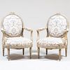 Pair of Louis XVI Style Grey Painted and Parcel-Gilt Fauteuils, After a Design by Jean-Baptiste Tilliard