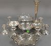 Twelve piece lot of sterling silver including eight weighted pieces and four dishes. 10.5 t oz. plus weighted pieces.