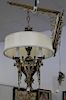 Gothic style heavy brass 24 light chandelier, each light having griffin supported arms with matching wall mount hanging arm. 