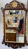 Two Chippendale style mirrors including one Margolis with one top ear missing and other repaired. 45" x 25" and 39" x 21 1/2"