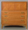 Modern walnut chest with drop front having two fitted drawers. ht. 47in., wd. 44in.