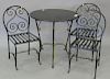 Four piece iron set with metal top table. ht. 29in., dia. 29in.