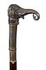 59. Elephant Sword Cane- Ca. 1955- A cast whimsical elephant with a 25” foil blade with push and pull mechanism, hardwood s