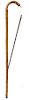 110. Saw Cane- Ca. 1880- An English gardener’s saw cane with brass and iron attachments, beech shaft and a metal ferrule. O