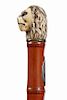 259. Walrus Sword Cane – Ca. 1880 – A carved lion walrus handle, bamboo shaft, with a blank silver metal cartouche push a