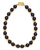 An 18 Karat Yellow Gold and Onyx Bead Necklace, 102.50 dwts.