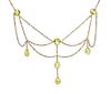 An Art Nouveau Yellow Gold and Peridot Swag Necklace, 4.10 dwts.