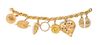 * A 18 Karat Yellow Gold Link Bracelet with Eight Attached Gold Charms, 48.20 dwts.