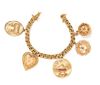 * An 18 Karat Yellow Gold Bracelet with Five Attached Charms, 44.40 dwts.