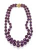 A 14 Karat Yellow Gold and Amethyst Double Strand Graduated Bead Necklace, 86.40 dwts.