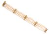 An 18 Karat Yellow Gold, Diamond and Cultured Pearl Multistrand Bracelet, 22.80 dwts.