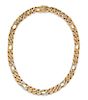 A 14 Karat Bicolor Gold and Diamond Figaro Chain Necklace, Hammerman Brothers, 51.80 dwts.