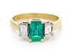 An 18 Karat Yellow Gold, Emerald and Diamond Ring, 2.60 dwts.