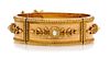 A Tricolor Gold and Pearl Bangle Bracelet, French, 26.70 dwts.