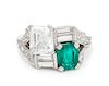 * A Platinum, Diamond and Emerald Ring, 9.00 dwts.