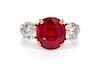 A Platinum, Yellow Gold, Burmese Ruby and Diamond Ring, 4.70 dwts.